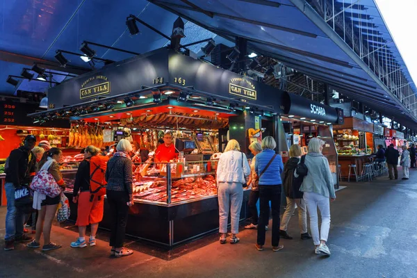 Barcelona, Spain - 20 April, 2016: People shop In Barcelona. Market Mercat de Sant Josep de la Boqueria