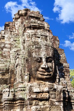 WAT Bayon Tapınağı yüz Angkor, Kamboçya'da