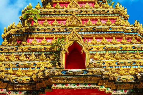 bas-relief Facade Close up of beautiful temple Wat Samai Kongka on Ko Pha Ngan, Thailand.