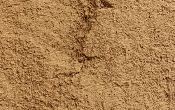 Kahverengi zeminde soyut bir yüzey. Yumuşak toprak dokusu ve arkaplanı — Stok fotoğraf