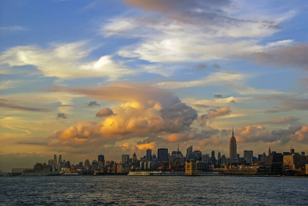 View on Manhattan from Hudson river at beautiful sunset, New York City, USA