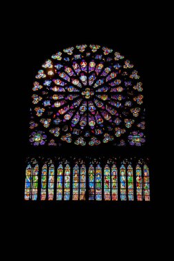 Paris, France - September 23, 2008: Stained glass Rose window in the Cathedral of Notre Dame de Paris, Ile de la Cite clipart