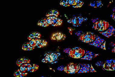 Paris, France - September 23, 2008: abstract fragment of Stained glass Rose window in the Cathedral of Notre Dame de Paris, Ile de la Cite clipart