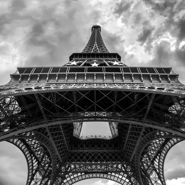 Eiffel Tower in monochrome. Tour Eiffel from below. Wide-angle view from beneath. Paris, France