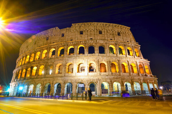 Illuminated Colosseum at night, Rome, Italy. Beautiful night cityscape suitable for backgrounds.