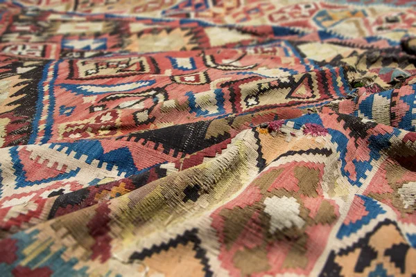 Armenian traditional carpet with traditional ornaments and patterns at Mulberry festival in Karahunj village, Armenia