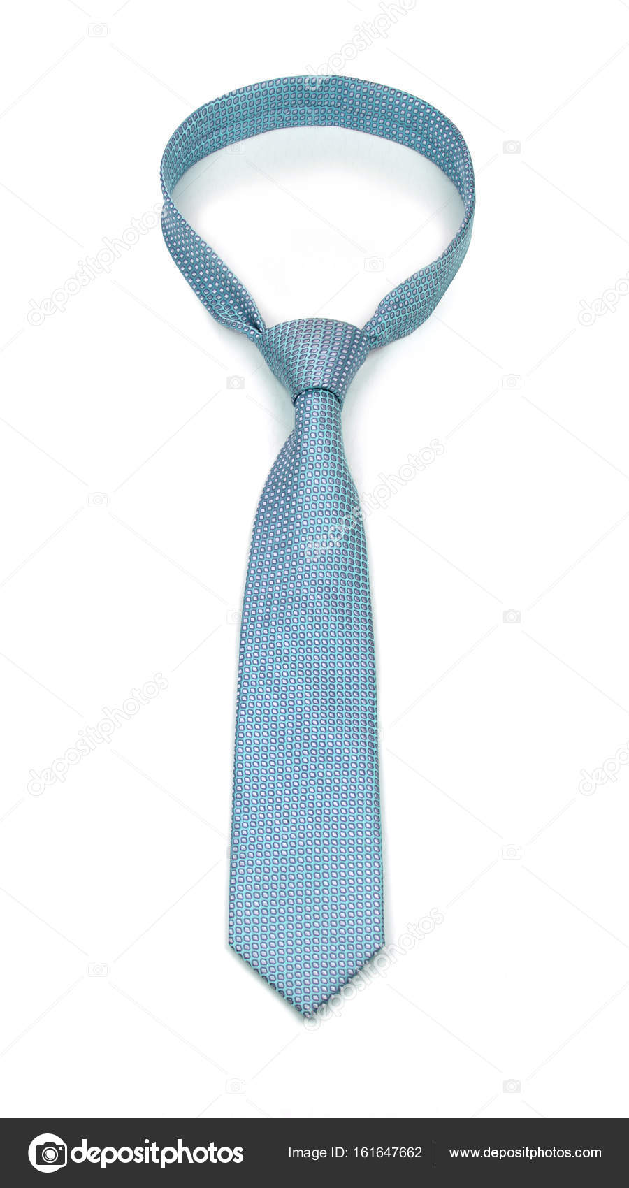 Stylish tied light blue tie with white dots isolated on white background Stock Photo by ©artavet