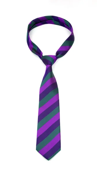 Стильна пов'язана зелена та фіолетова смугаста краватка ізольована на білому тлі — стокове фото