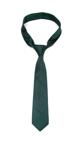 Стильный темно-зеленый галстук с точками на белом фоне — стоковое фото