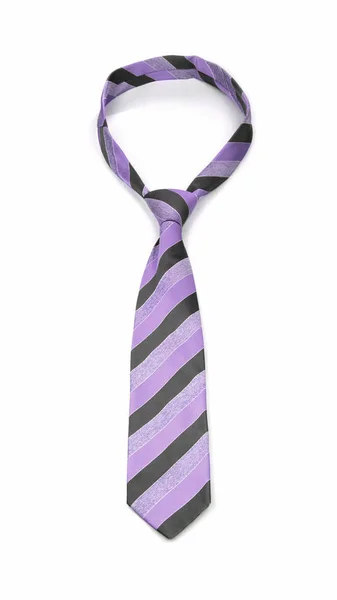 Stylowy wiązany fioletowy i szary krawat w paski na białym tle — Zdjęcie stockowe