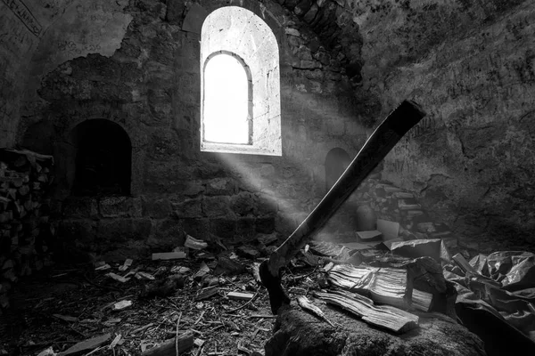 interior of utility room at Tatev monastery, pierced with sunbeam, 9-th century, Armenia. black and white photography