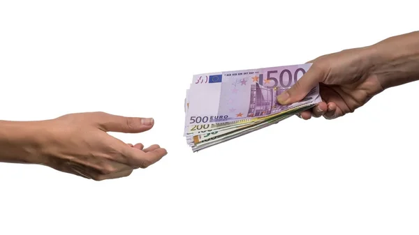 Close-up de mão pessoa dando dinheiro a outra mão isolada no fundo branco — Fotografia de Stock