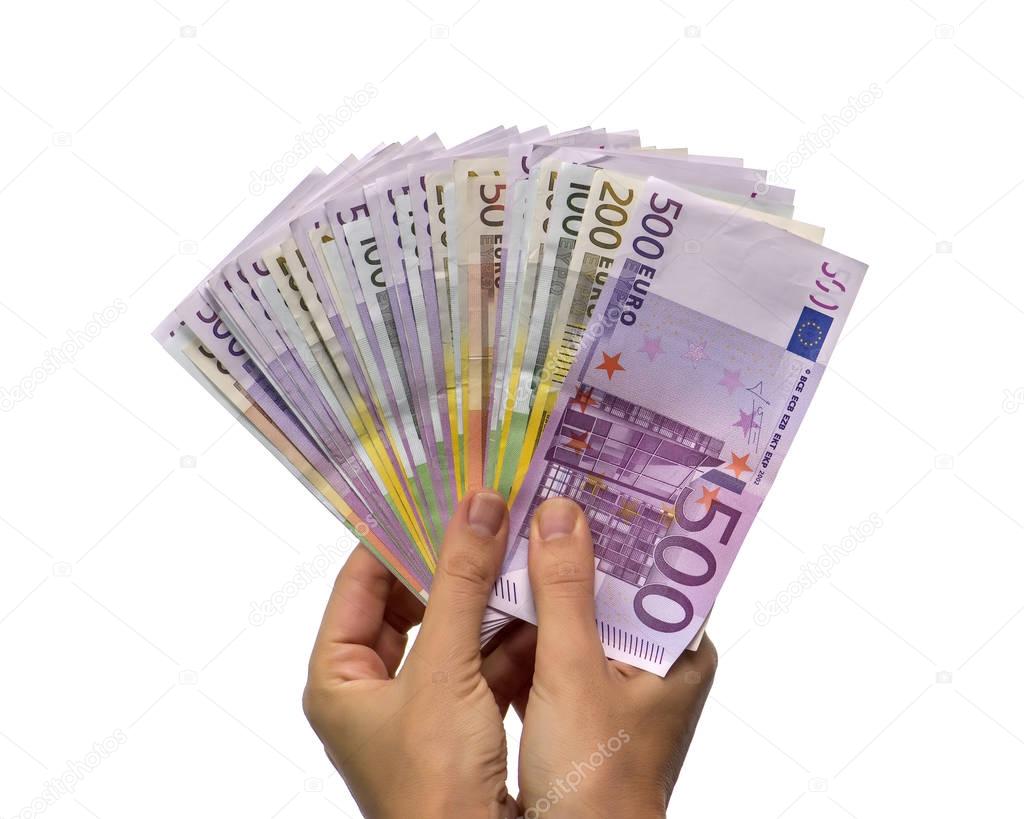 woman hands hold or given money isolated on white background. Euro currency (EUR) with 500, 200, 100 and 50 euro bank notes