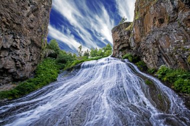 Jermuk waterfall, Vayots Dzor, Armenia. It has 72 m height and spilling slant into Arpa River reminds girl's hair. Hence another name for a waterfall, Mermaid hair. Dramatic bluff rocks clipart