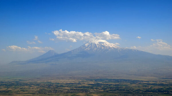 Ararat mountain with clouds, view from airplane