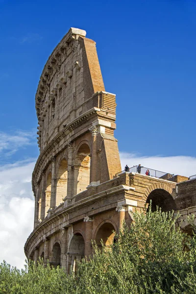 Colosseum or Coliseum in Rome, Italy. It is the main travel attraction of Rome. Colosseum in the sunlight. Rome landmark. Historical architecture and ruins in central Rome