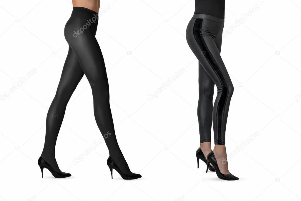 Two beautiful sexy girls in nylon black tights and leggings and high heels posing isolated on white background. Women in hosiery