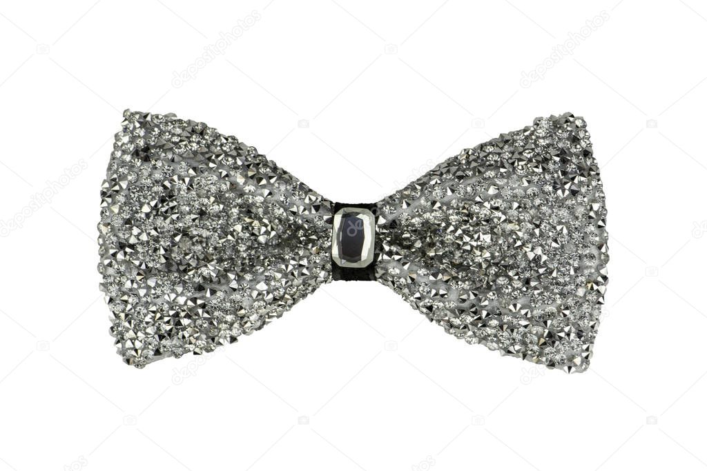 Glamorous silver sparkling glitter decorated bow tie with jewel in the centre, trendy fashion accessory isolated on white background