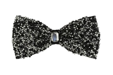 Ortasında mücevher olan gümüş parıltılı parlak papyonlu göz kamaştırıcı siyah aksesuar beyaz arka planda izole edilmiş moda aksesuarı.