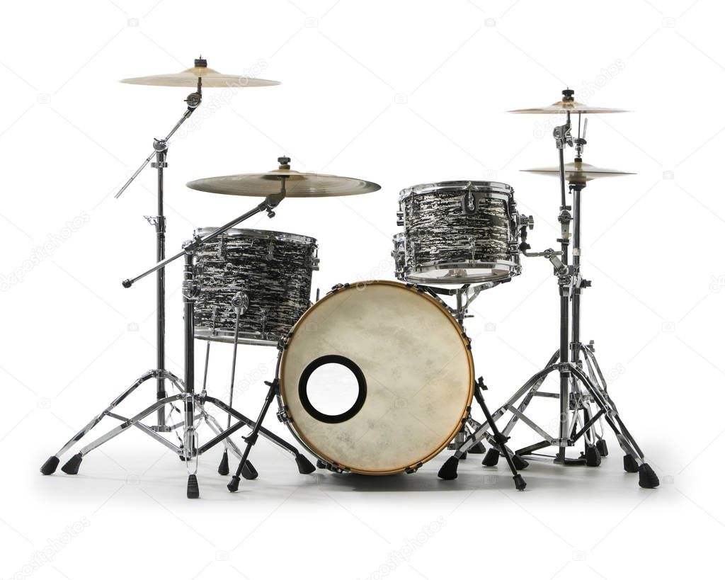 Drums and cymbals construction on white background. Collection of percussion musical instruments. Modern drumset. Drumming solo, rock music concert design element. Music instruments series