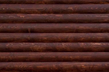 Kahverengi arkaplan desenli ağaç gövdeli ahşap duvar. Yakın çekim görünümü
