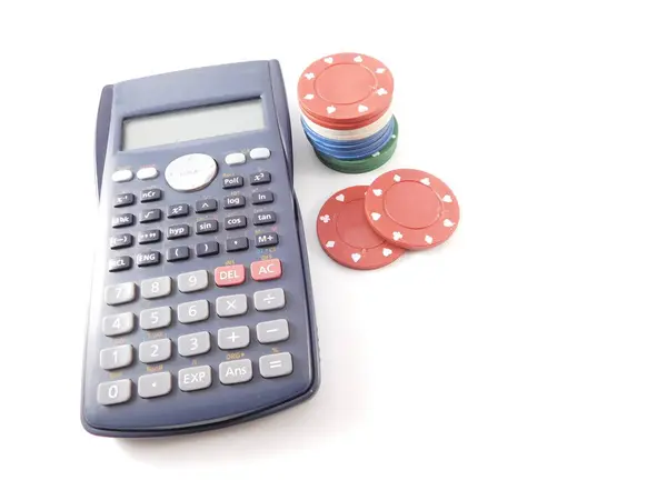 Calculadora y fichas de poker . —  Fotos de Stock