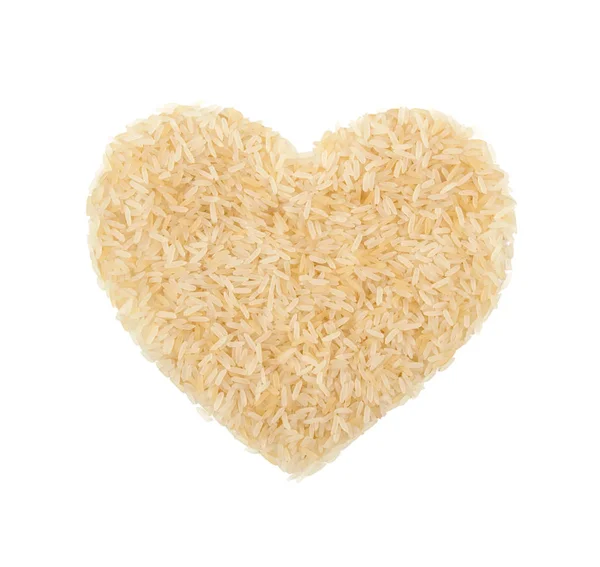 Ryż w postaci serca. Na białym tle na białym tle. Widok z góry. Uwielbiam ryż. — Zdjęcie stockowe
