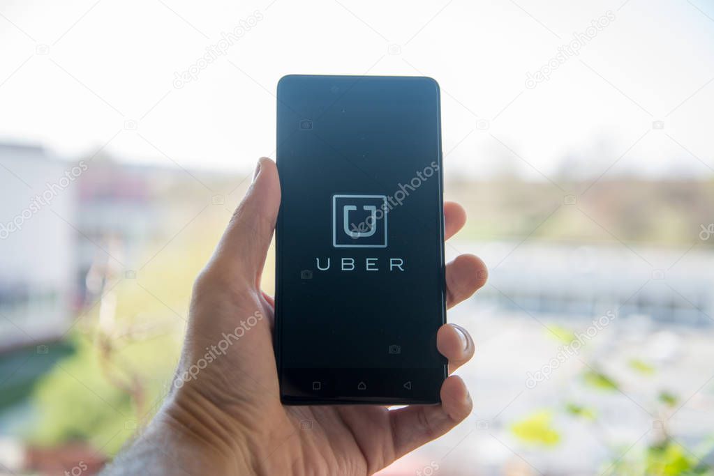 Nitra, Slovakia, March 20, 2017: Uber application logo on smartphone