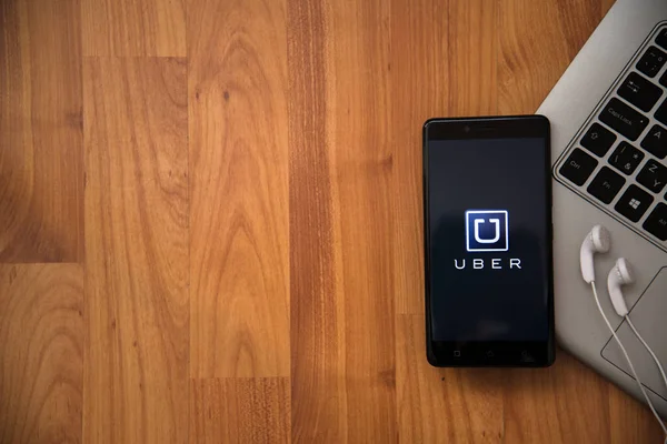 Uber application on smartphone — Stock Photo, Image