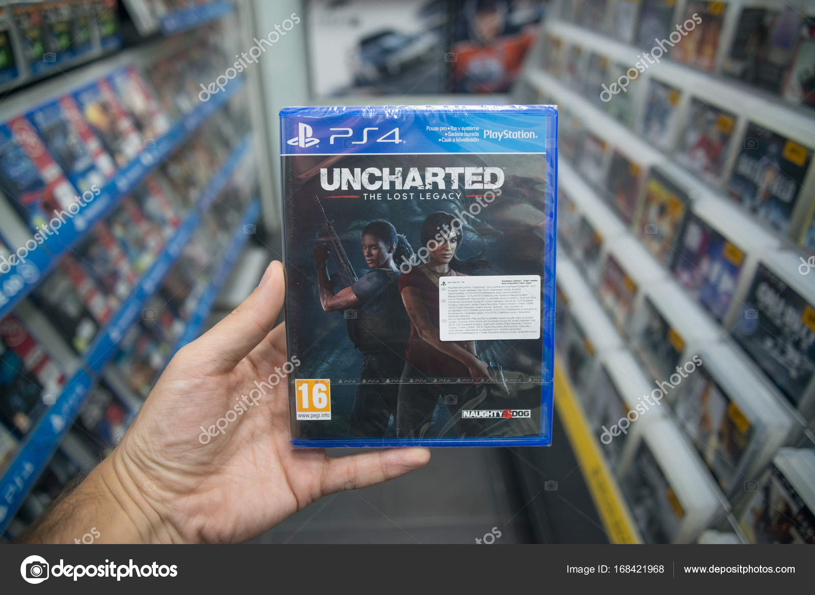 Человек, Держащий Uncharted Потерянная Видеоигра Наследия На.