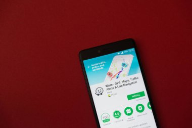 Los Angeles, 11 Aralık 2017: Smartphone Waze uygulama Google ile oynamak mağaza kırmızı zemin üzerine
