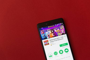 Los Angeles, 11 Aralık 2017: Smartphone ile Slotomania Yuvaları Oyun uygulama google oyun deposunda bulunan kırmızı arka plan