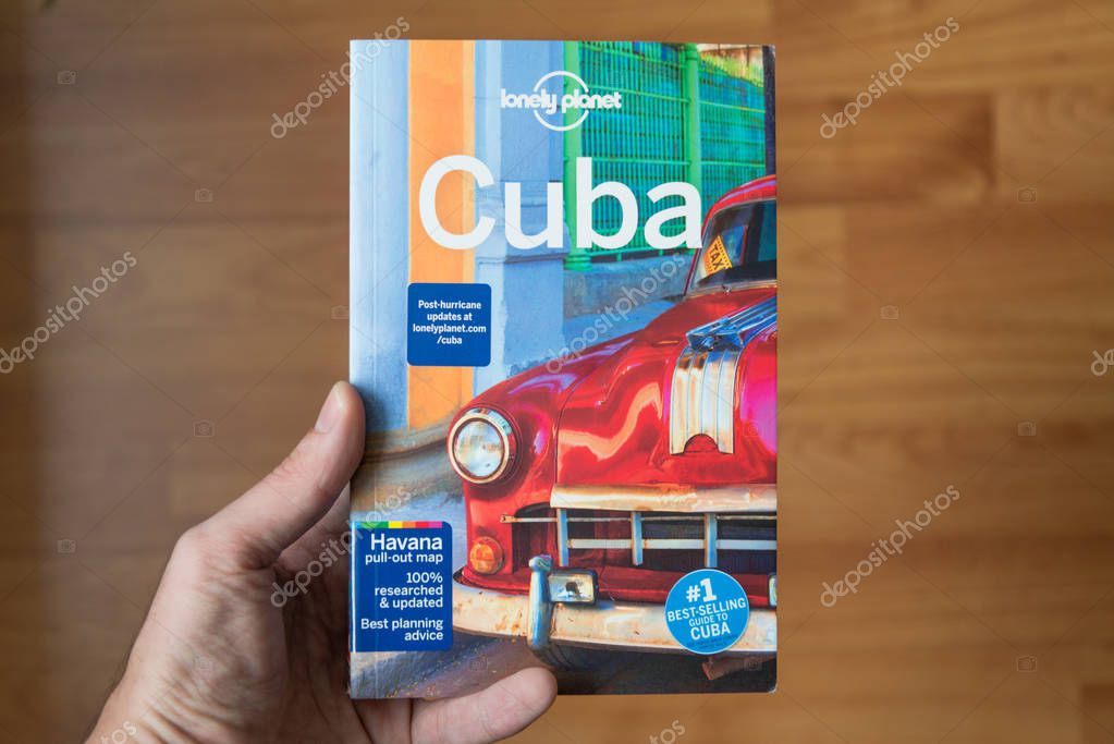 Nitra, Slovakia, december 22, 2017: Lonely planet Cuba travel guide book. Lonely Planet is the largest travel guide book publisher in the world.
