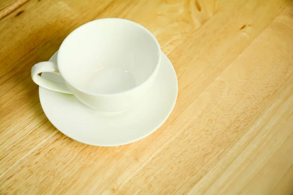 Taza de café vista superior en mesa de madera . — Foto de Stock