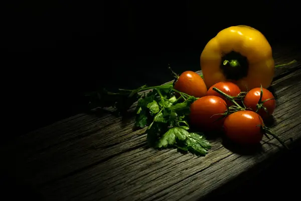 Fresh vegetables on an old wooden table — Stock Photo, Image