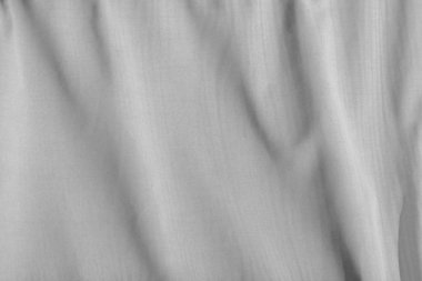 Asılan beyaz kumaşlı arkaplan