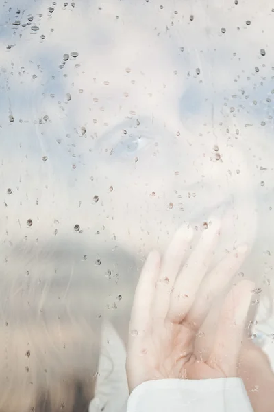 Melancholy reflection of the girl in the window — Stock Photo, Image