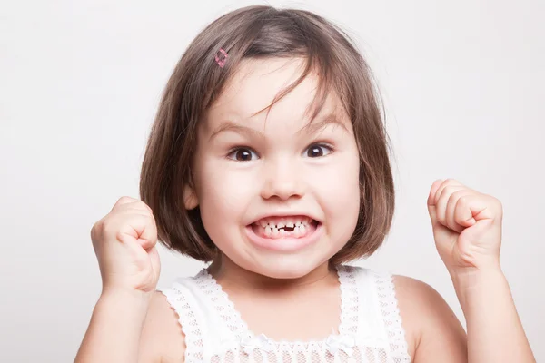 Child dropped the first milk tooth — Stock Photo, Image