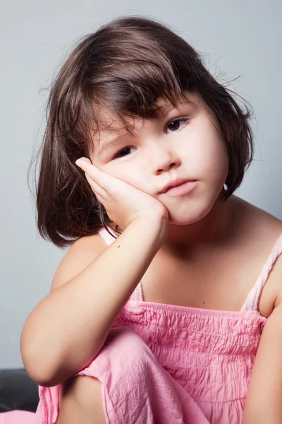 Bored little Asian girl — Stock Photo, Image