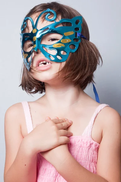 Little girl in carnival mask — Stock Photo, Image