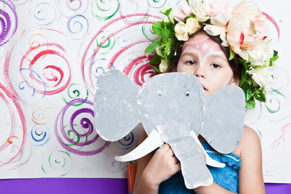 Portrait of a child with elephant