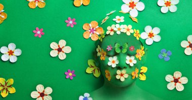 Female face in flowers  clipart