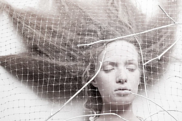 Pale woman in cocoon — Stock Photo, Image
