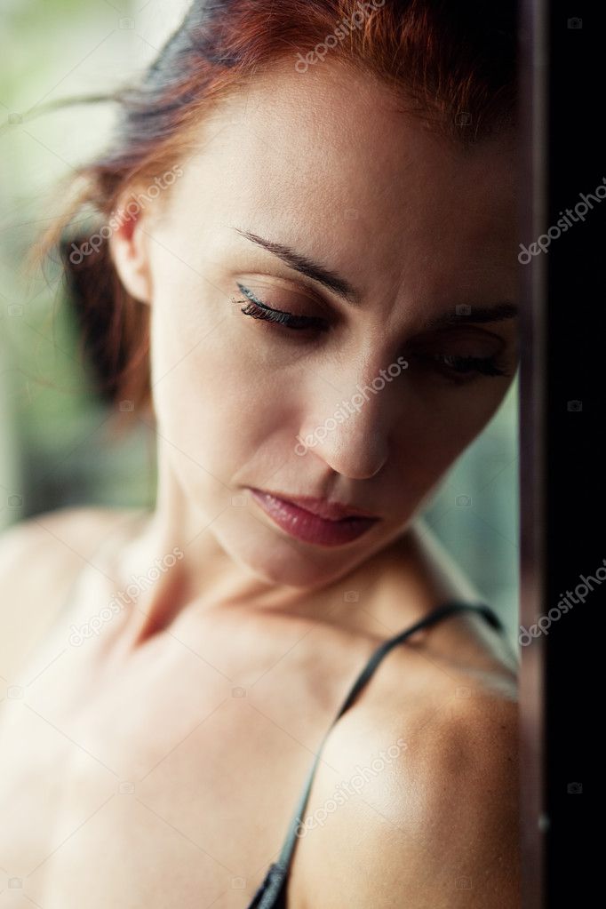 Beautiful melancholic woman Stock Photo by ©RadaRani 128274650
