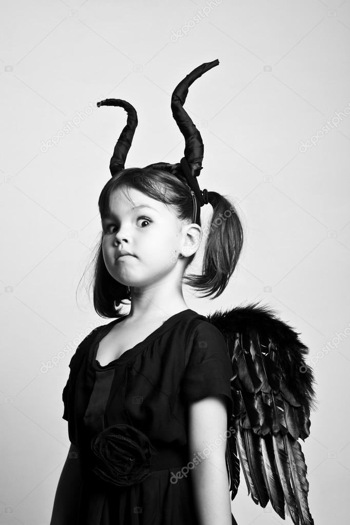 Little girl with horns and wings 