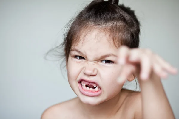 Girl showing off her missing milk teeth — Stock Photo, Image