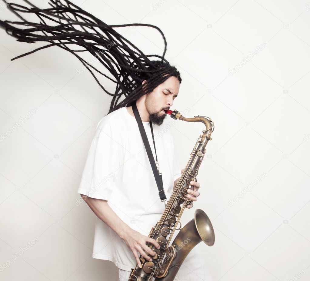 Male saxophonist with dreadlocks