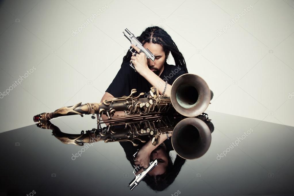 saxophonist with a gun  in hand