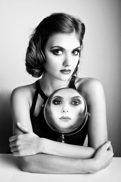 beautiful woman with mirror