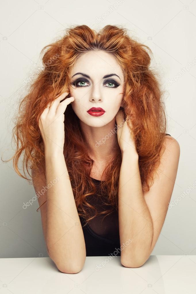 redhead woman in black dress